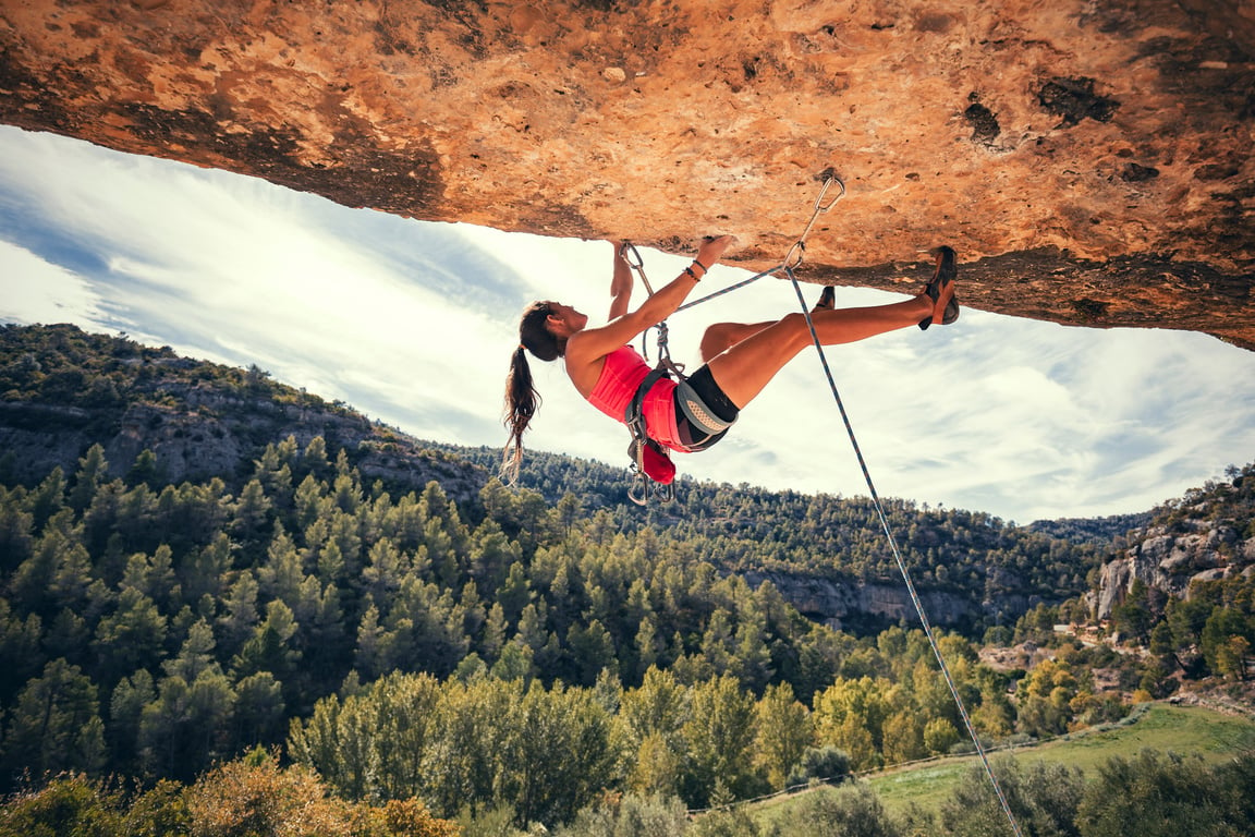 Woman rock climbing